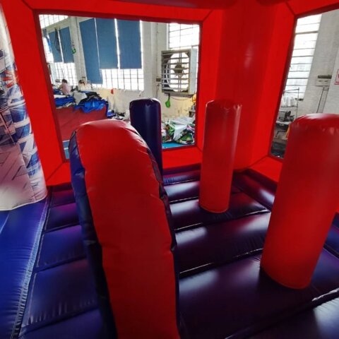 Superhero themed inflatable bounce house