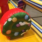 Candy from the Candyland inflatable bounce house