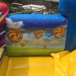 Candy from the Candyland inflatable bounce house