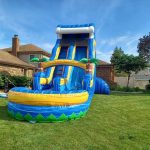 Colorful bounce house with an attached slide